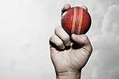 istock Cricket ball in hand 108267630