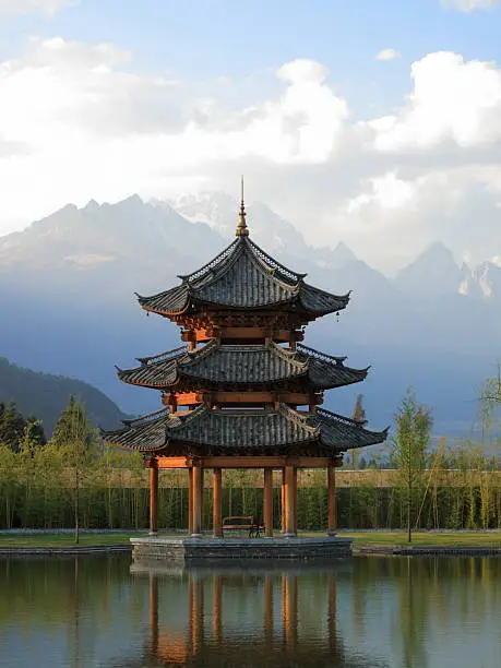 Photo of Chinese Pagoda Pavilion with Mountains in Background