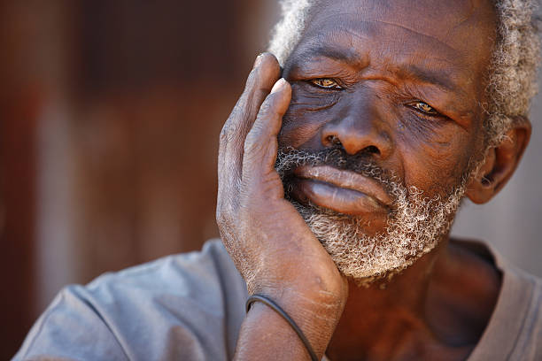 istock Senior African man resting chin on hand 108267724