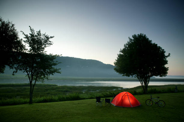 Camping tent at Samet Nang she Viewpoint with mountains in the Andaman Sea, Phang Nga, Thailand.
