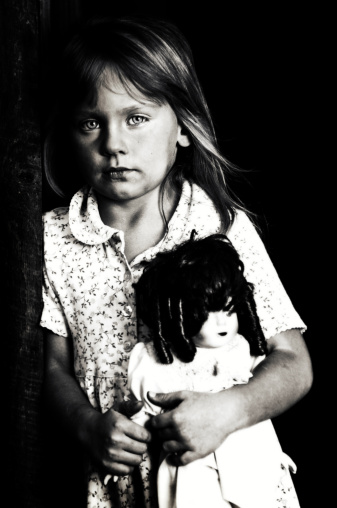 Sad little girl with her doll in poverty.\n[url=http://www.istockphoto.com/my_lightbox_contents.php?lightboxID=6901748] [img]http://www.alifeilluminated.com/IStock_Dark.jpg[/img] [/url]