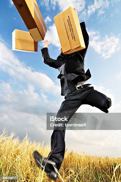 Flying Businessman Stock Photo - Download Image Now - Delivering, Low Angle View, Men