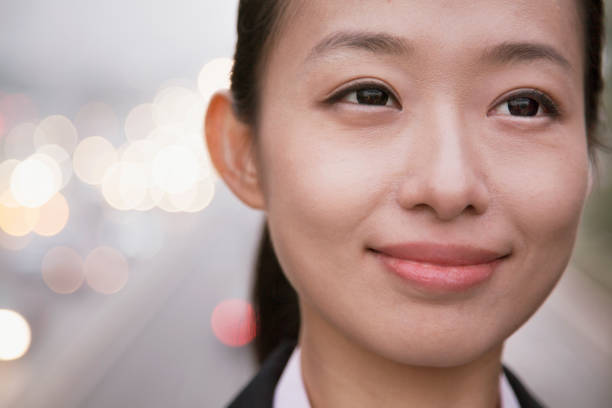 istock Chinese woman looking up 1082682502