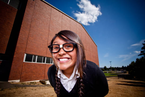 Nerdy Hispanic Girl Smiling at the Camera stock photo