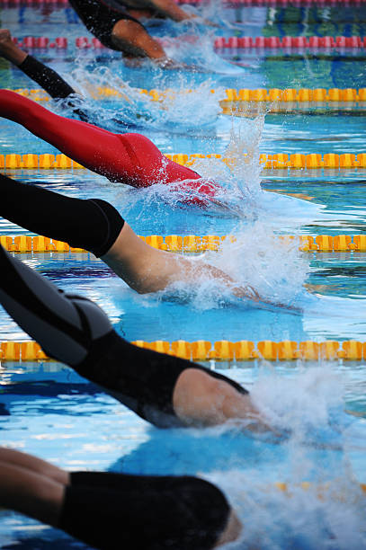 istock Male swimmers diving 108268529