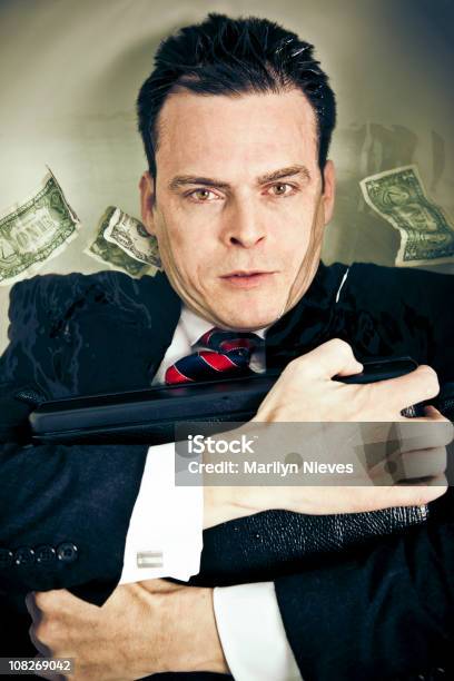 Surviving The Recession Stock Photo - Download Image Now - Currency, Greed, Businessman