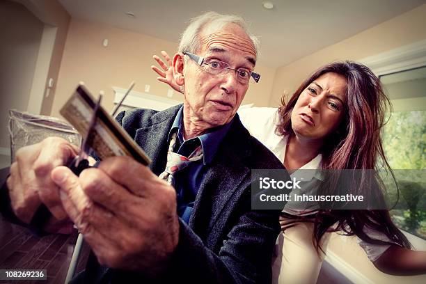 Cutting Up The Credit Cards Stock Photo - Download Image Now - Credit Card, Cutting, Anger