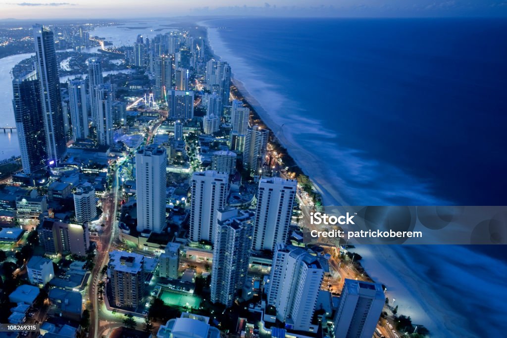 Gold Coast Aerial photo of Surfers Paradise and the Gold Coast at dusk. The Gold Coast is found in Queensland Australia. Aerial View Stock Photo