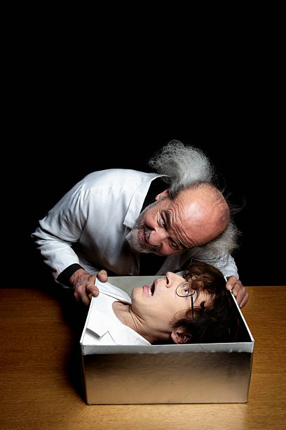 Mad Male Magician Puts Subject's Head in a Box