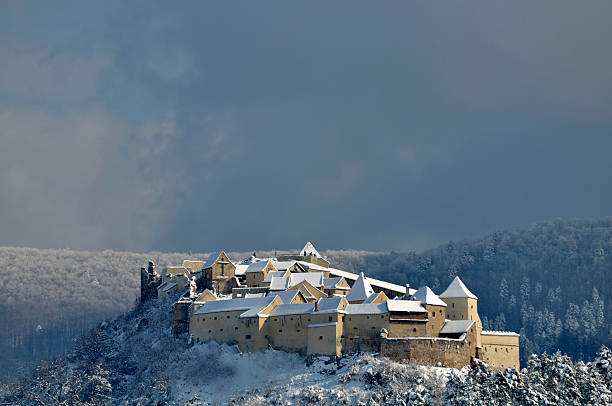 istock Rasnov castle in Romania covered with snow 108269348