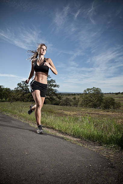 istock A female doing cross country running 108269384