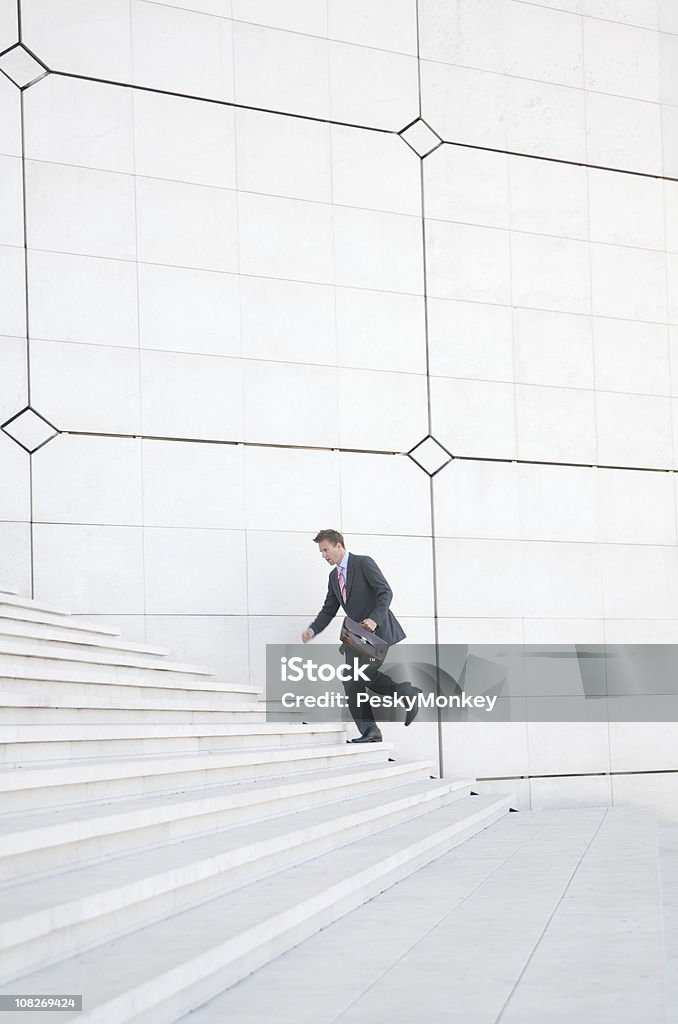 Businessman Running up Staircase  Achievement Stock Photo