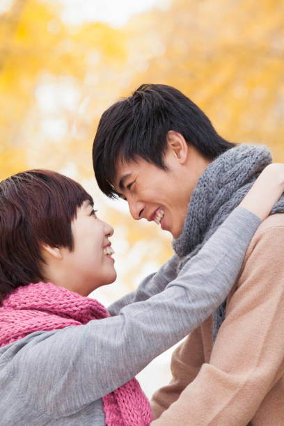 istock Chinese couple hugging 1082694534
