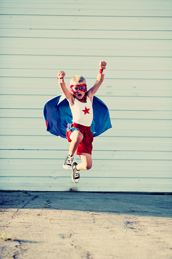 Up, Up and Away! A young superhero takes flight. It is never too early to be super. 