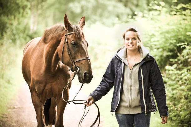 istock Rider walking her horse 108269665