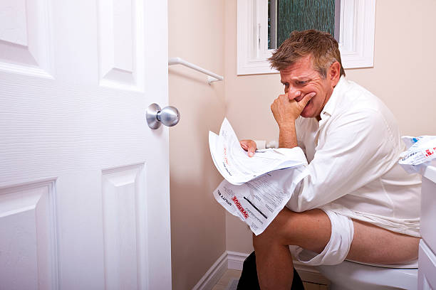 Man stressed over bills stock photo