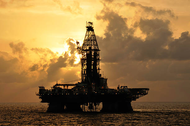 istock Offshore oil rig with sun 108269750