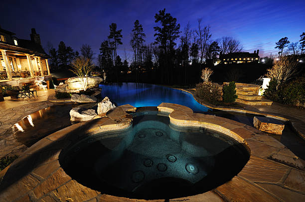 istock Home Exterior With Swimming Pool At Night 108269867