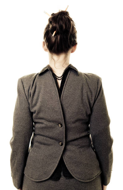 Business concept. Businesswoman wearing a suit back to front. Black and white.