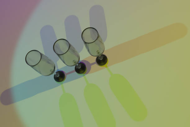 istock Transparent glasses. Color lighting background. 1082703724