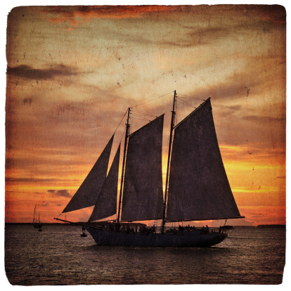 Weathered, antique photograph of tall ship