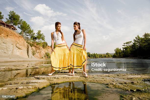 Twins Posing Stock Photo - Download Image Now - Adult, Full Length, Twin