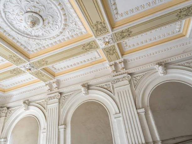 istock Stucco ceiling and wall. Molding, cornice. Old plaster architectural elements of the interior 1082706844