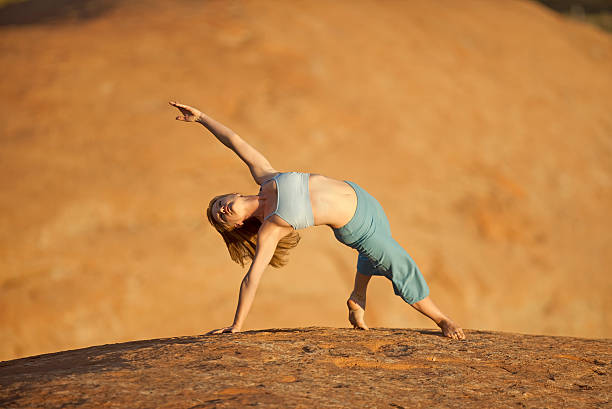 istock Woman Outdoors Stretching In Triangle Yoga Pose 108270786