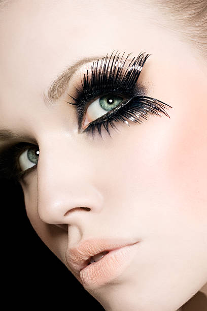 Young Woman Wearing Black Fake Eye Lashes stock photo