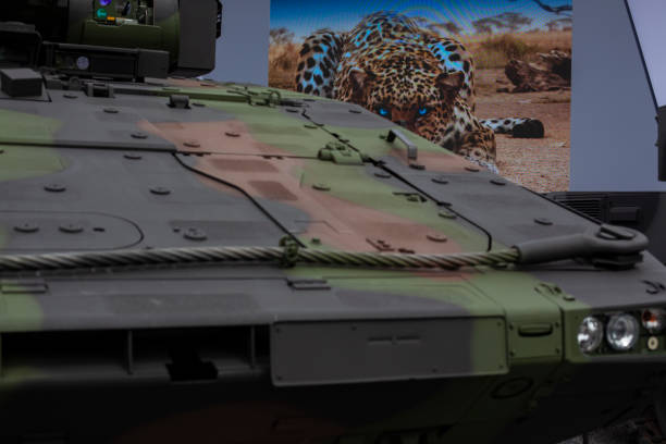 special military armored vehicle armored military vehicle designed to transport troops with cannon to shoot presented at the fair jeep 4x4 off road vehicle world war ii stock pictures, royalty-free photos & images