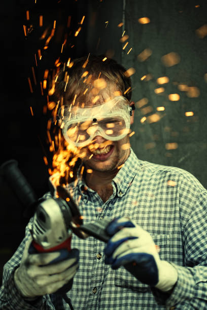 Crazy man with metal cutter. stock photo