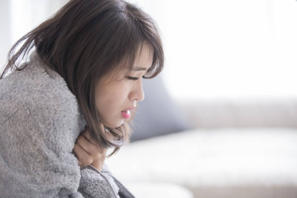 istock woman sick and feel cold 1082715804