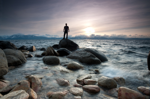 A man standing on a rock 