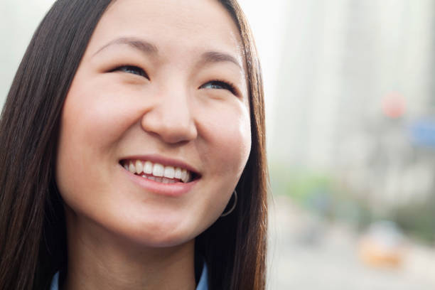 istock Smiling Chinese woman 1082717880