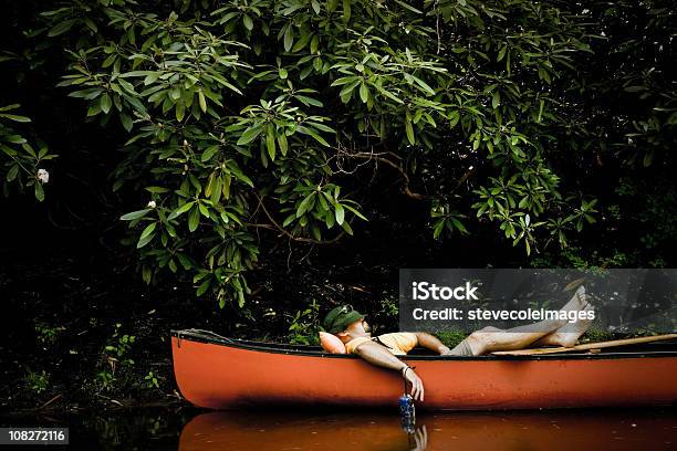 Man Taking Nap In Canoe Stock Photo - Download Image Now - Sleeping, Adult, Adults Only