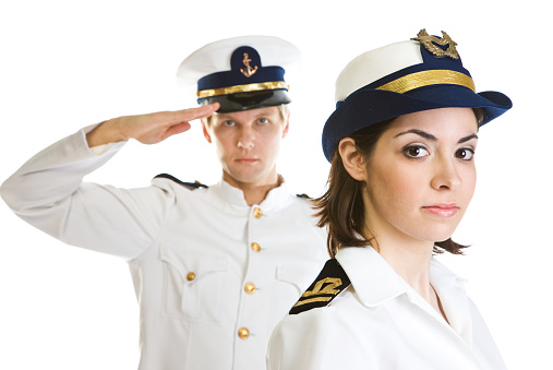 Navy series - Two navy personel in uniforms isolated on white background.