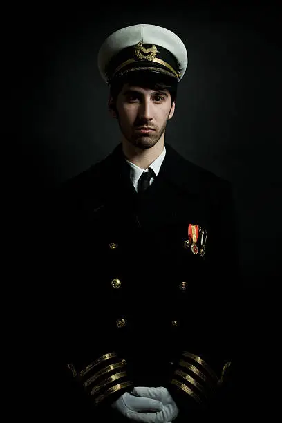 Navy series - Ship captain isolated on black.http://www.arsenik.com/istock/LBox_Navy.jpg