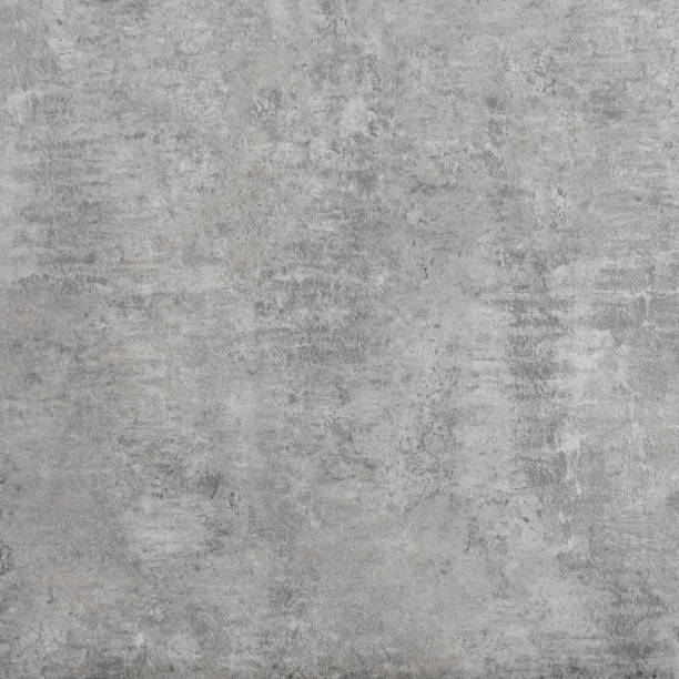 istock Rough grey concrete cement wall or flooring pattern surface texture. Close-up of exterior material for design decoration background 1082723146