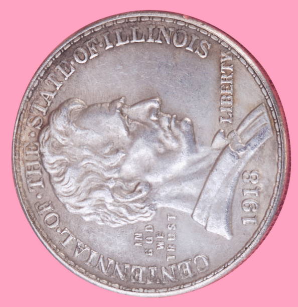 istock half dollar coin isolated on pink background 1082723386