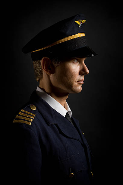istock Profile Portrait of Airline Pilot, Low Key 108272686
