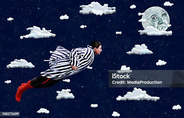 Young Boy Volar A Través De Dibujos Animados Nubes Foto de stock y más banco de imágenes de Niño - Niño, Fantasía, Viñeta