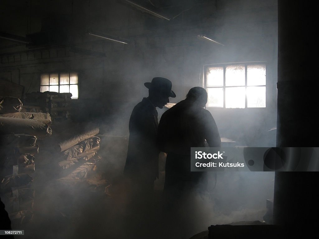 Silhouette of Men in Smoke  Mafia Stock Photo