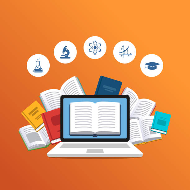 istock Laptop with the flying books on the background. 1082727456