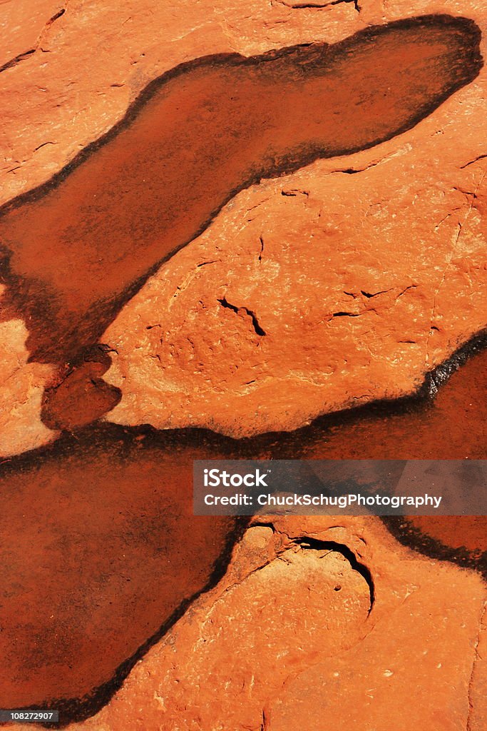 Charco de agua abstracto Desert Red Rock - Foto de stock de Agua subterránea libre de derechos