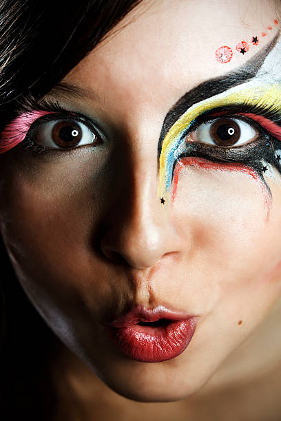 istock Young girl with ornate face makeup 108272968