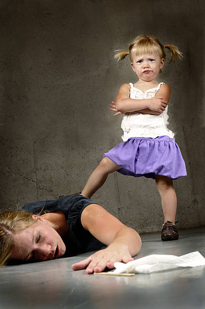 A two year old having a tantrum over her mother stock photo