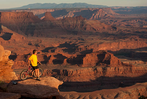 istock Cyclist Looking At View In Dead Horse Point State Park 108273405