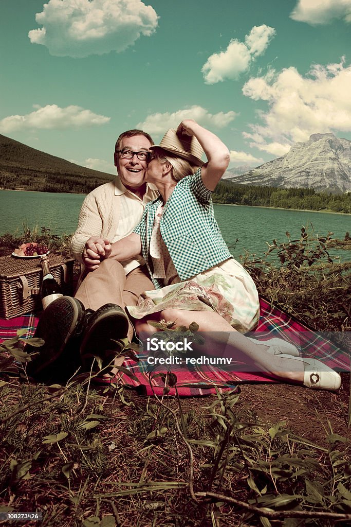 Romantic Picnic Kiss at the Lake  Picnic Stock Photo