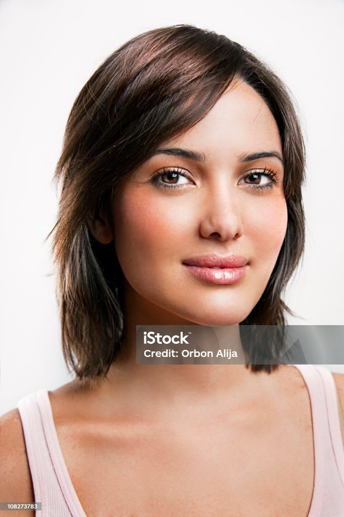 Young Woman With Shoulder Length Hair Smiling  18-19 Years Stock Photo