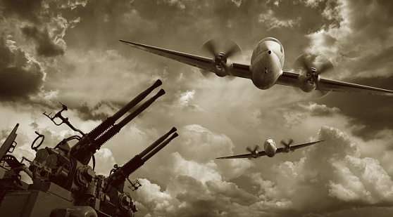 Flying aviones militares y pistolas de la máquina photo